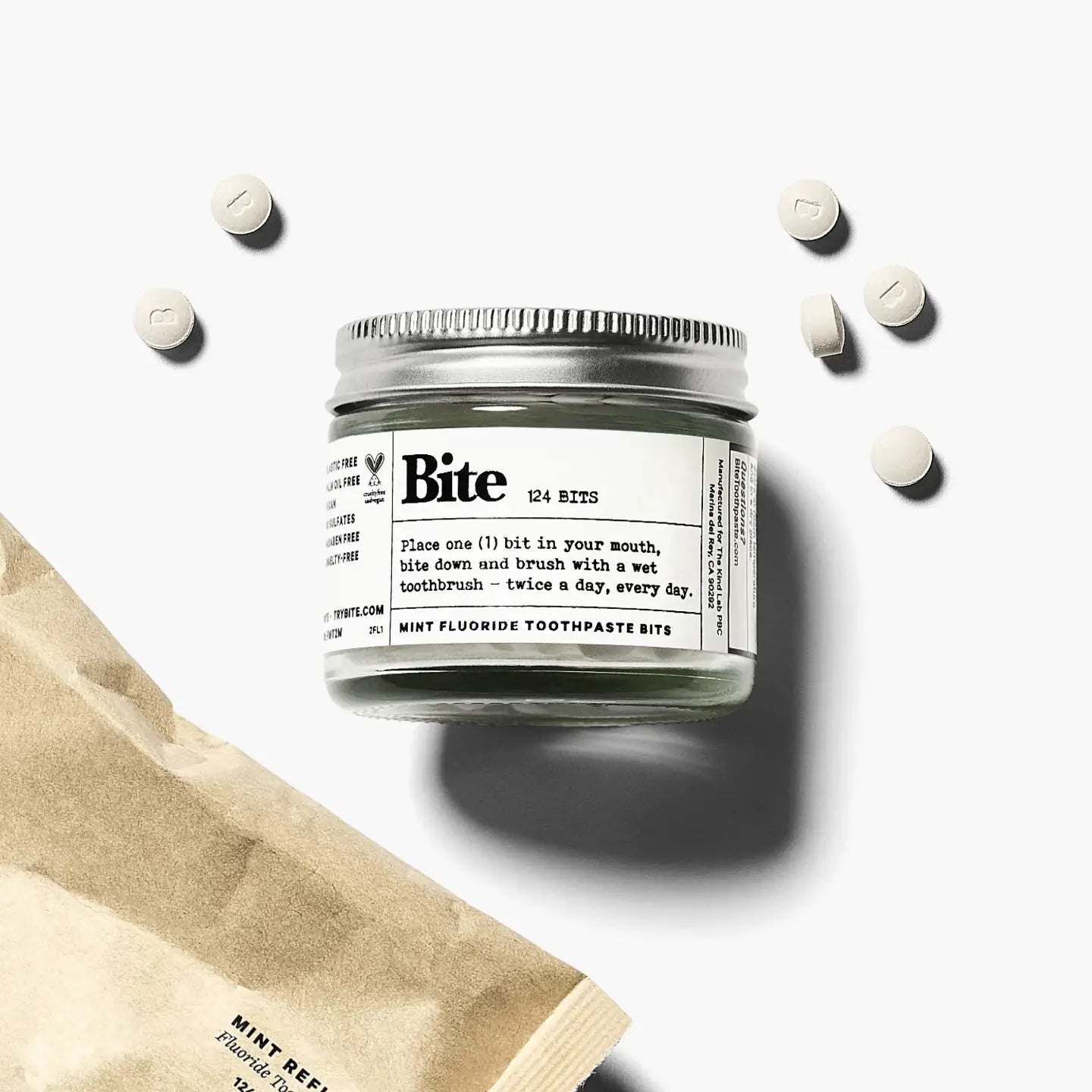 bite toothpaste in glass jar