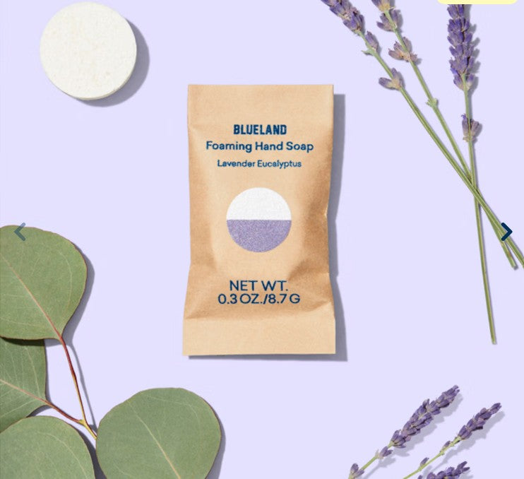 blueland foaming hand soap tablet pouch and tablet with lavender and eucalyptus sprigs