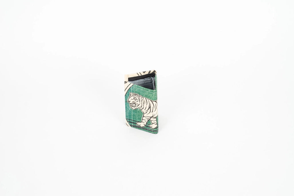 The Cement6 Wallets feature a green and white tiger illustration, artisan-made for those who value sustainable fashion—presented upright on a plain white background.