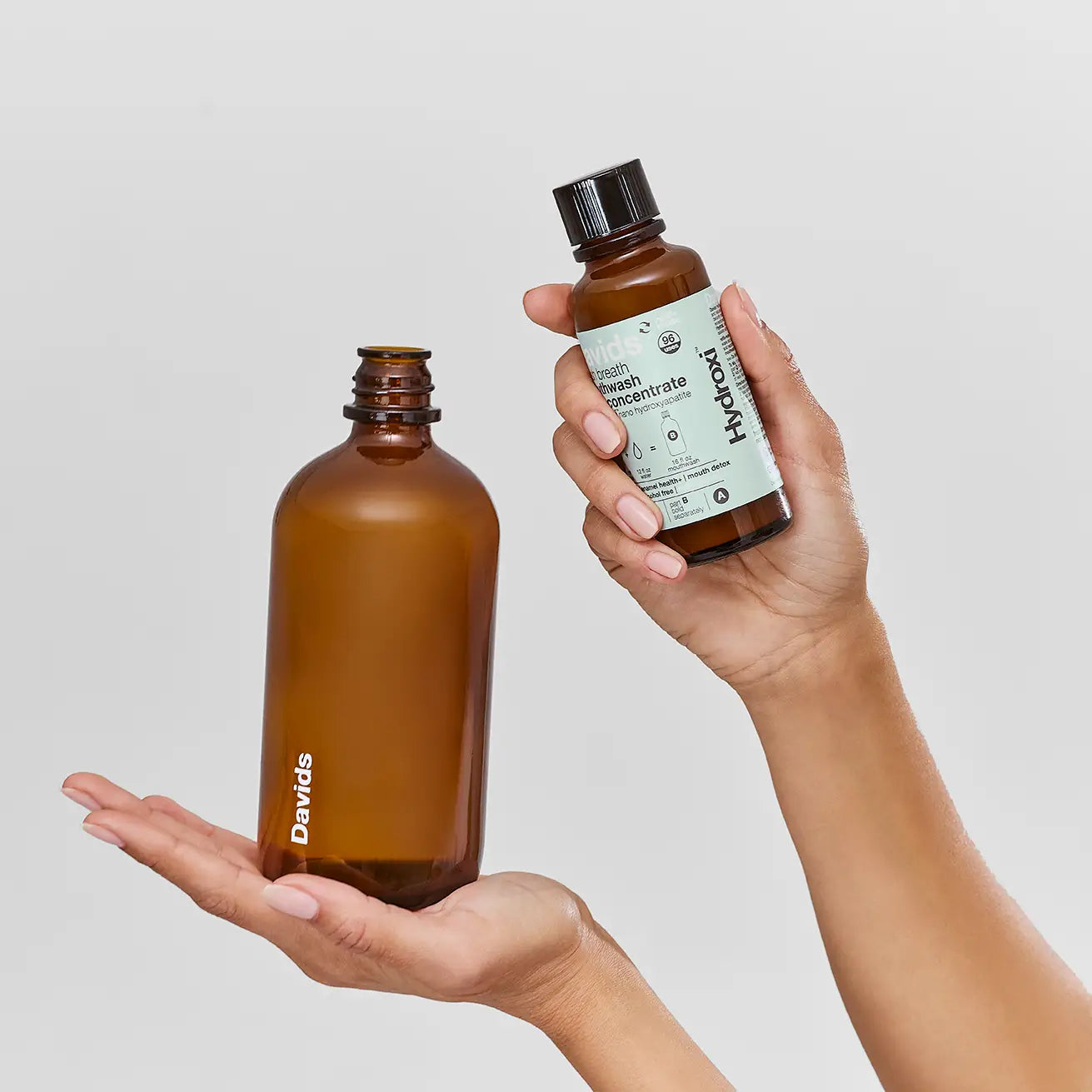 Alcohol-free mouthwash with nano hydroxyapatite for enamel health, fresh breath & gum care. Fluoride-free, refillable glass bottle, USA-made.