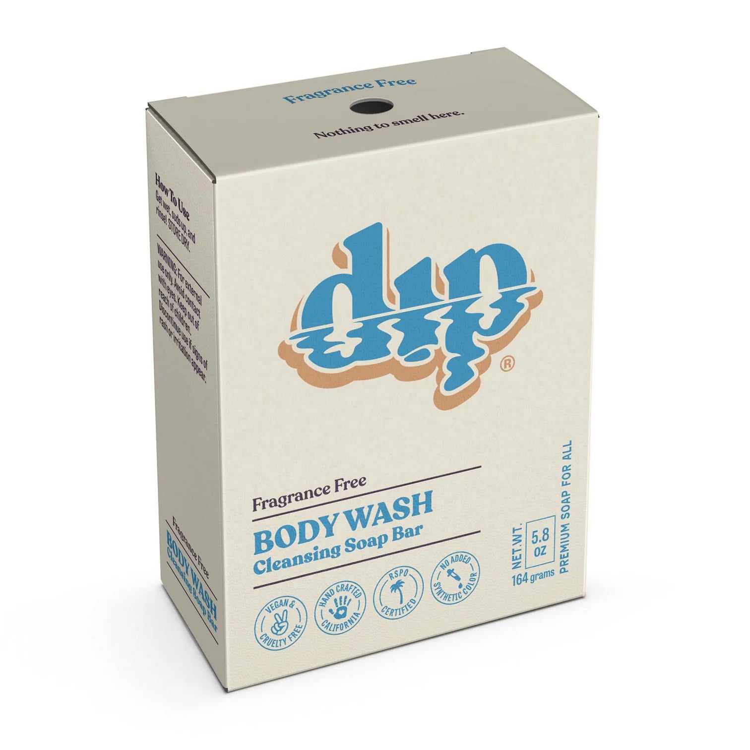 A beige box of Dip Body Wash Bars by Dip, 5.8 oz, with blue and beige text plus sustainability and cruelty-free icons displayed on the lower front of the eco-friendly packaging.