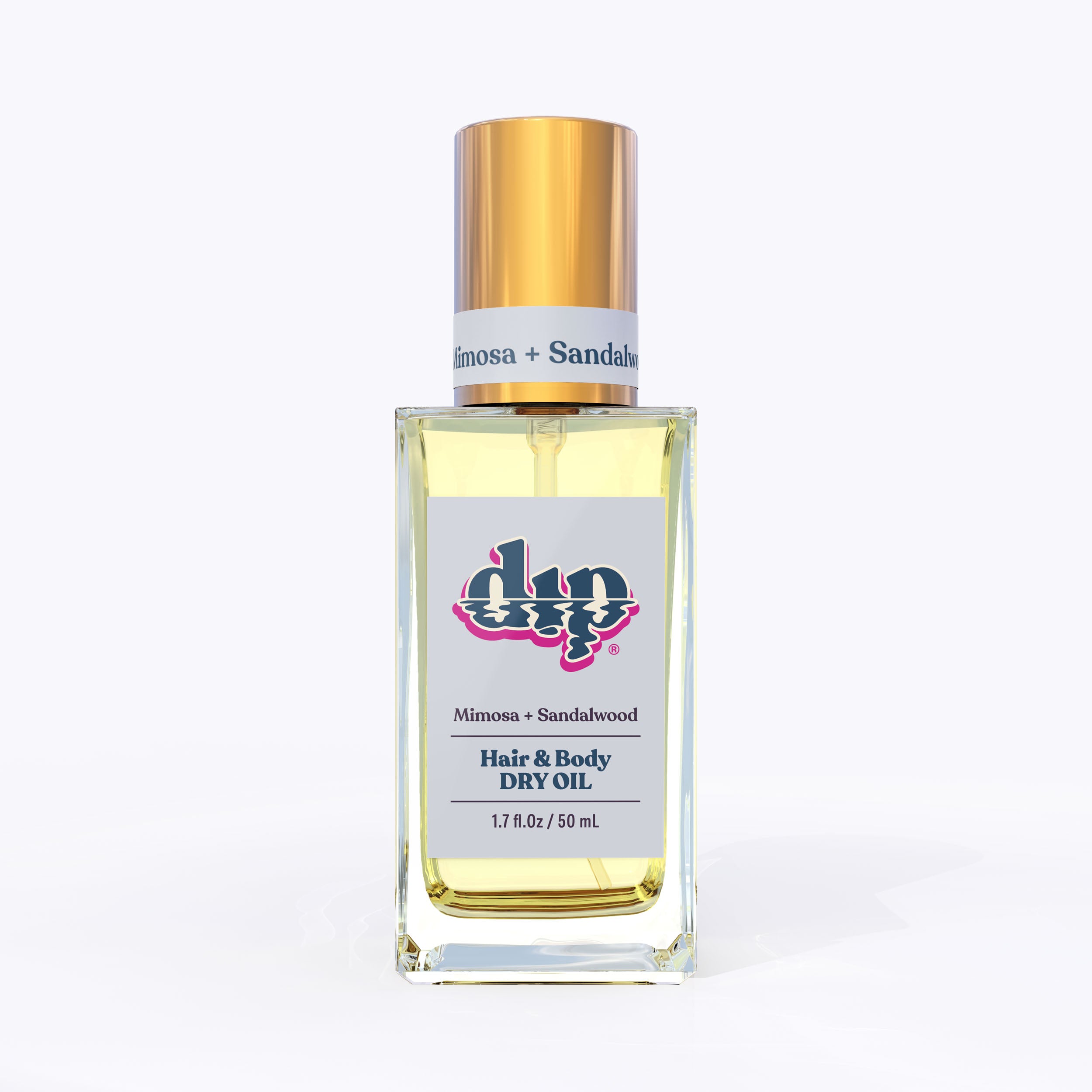 dip hair and body dry oil in a clear bottle with gold lid-mimosa sandalwood
