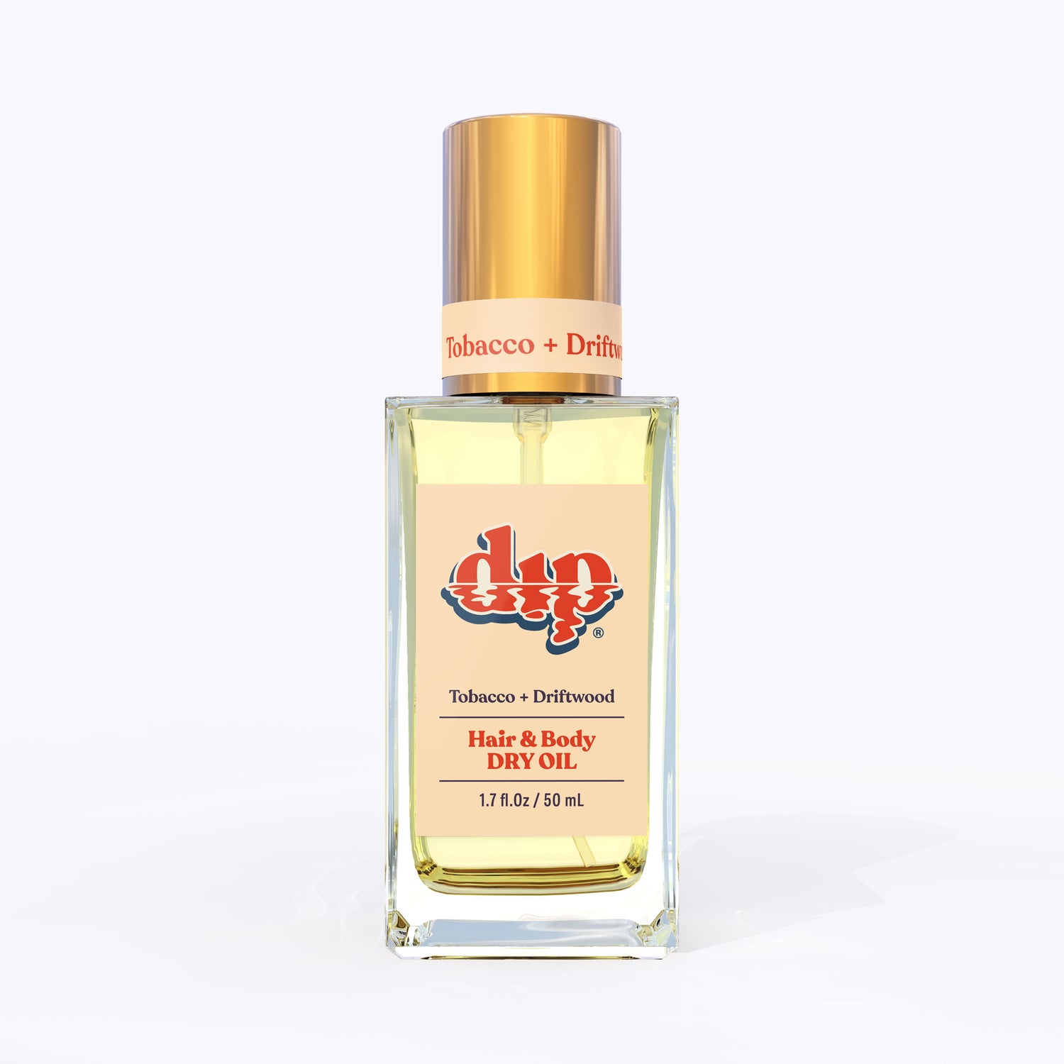 dip hair and body dry oil in a clear bottle with gold lid-tobacco driftwood