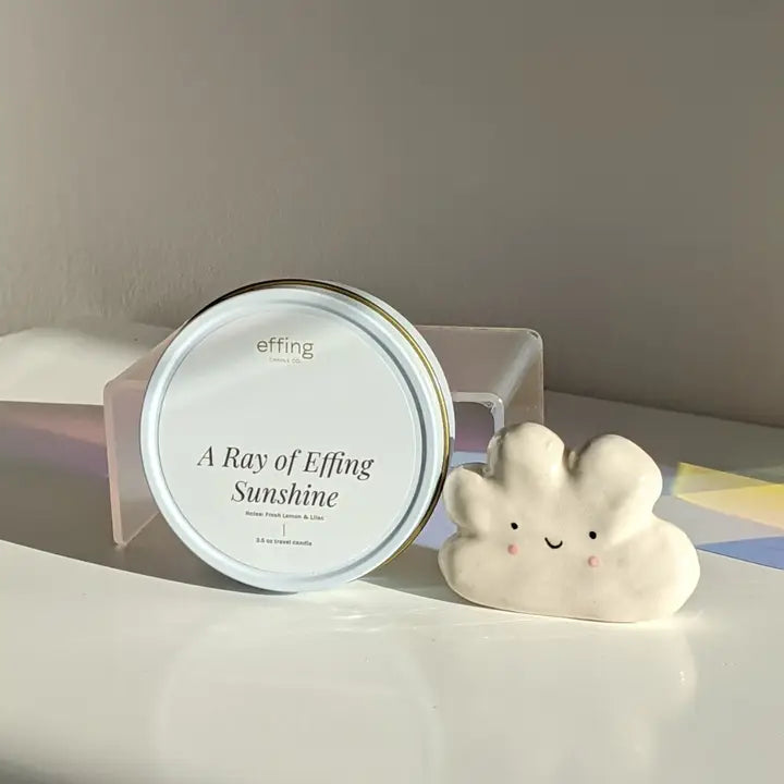 Candle labeled &