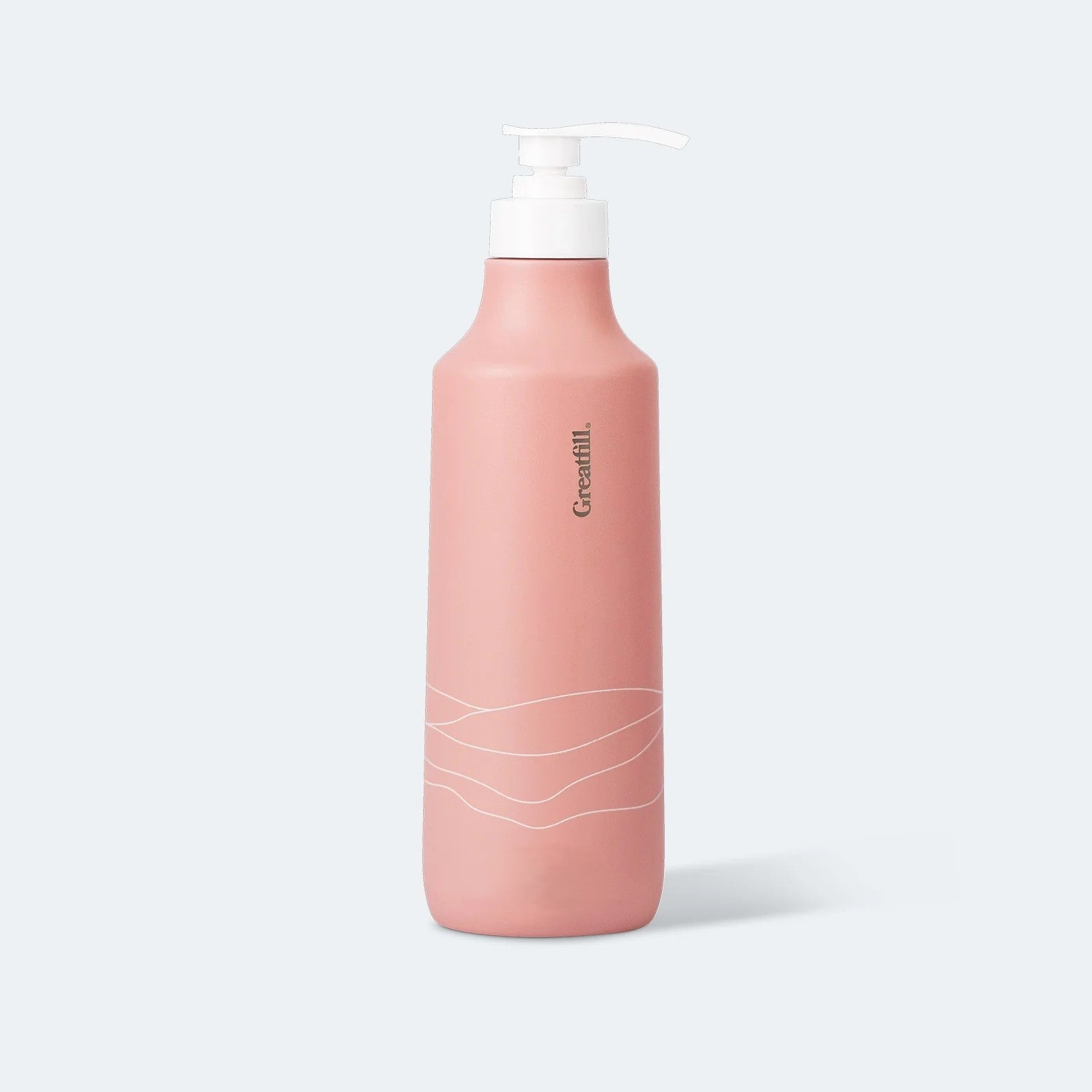 Pink bottle with pump on a light gray background