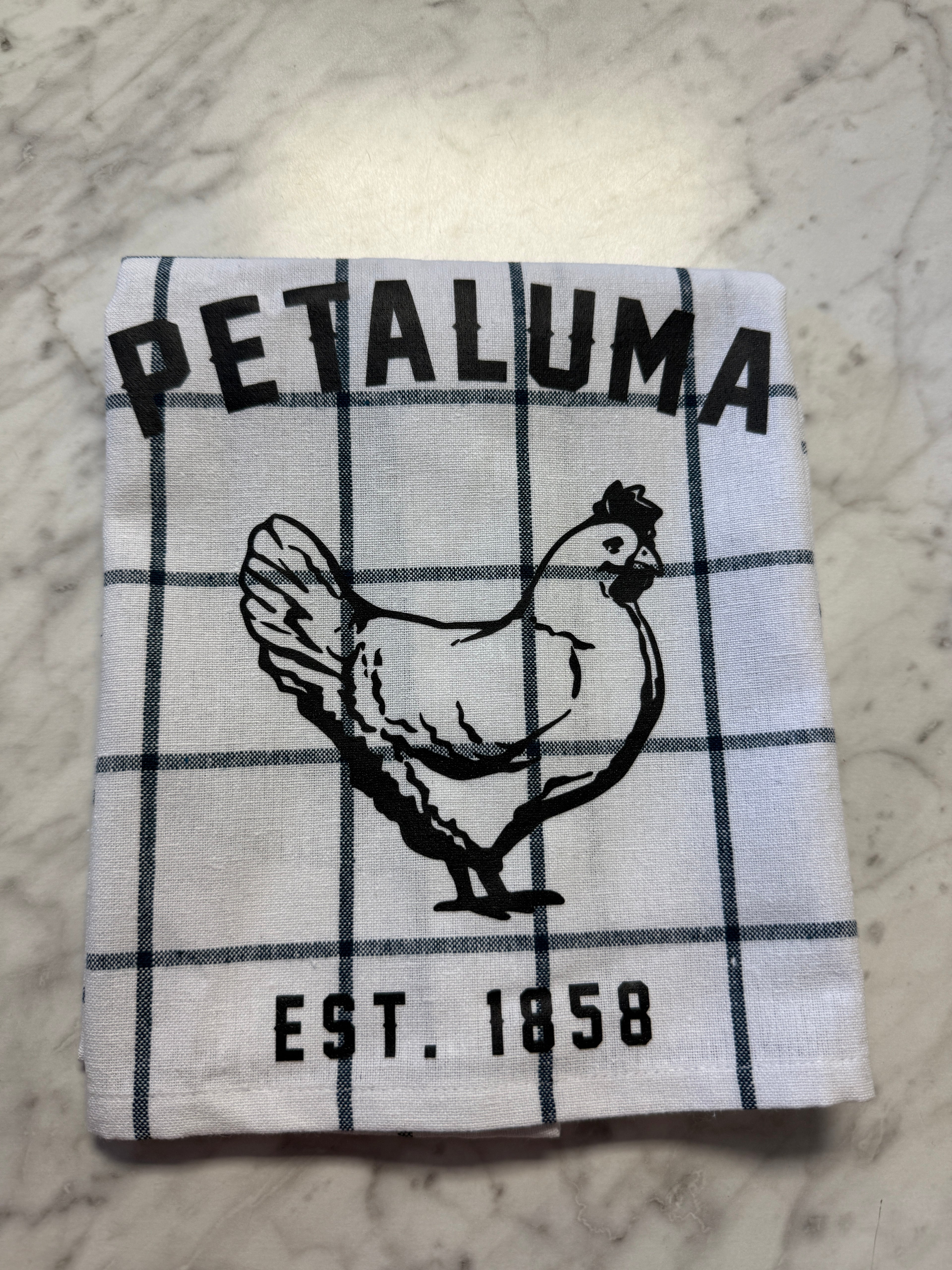 Fabric square with a chicken illustration and &
