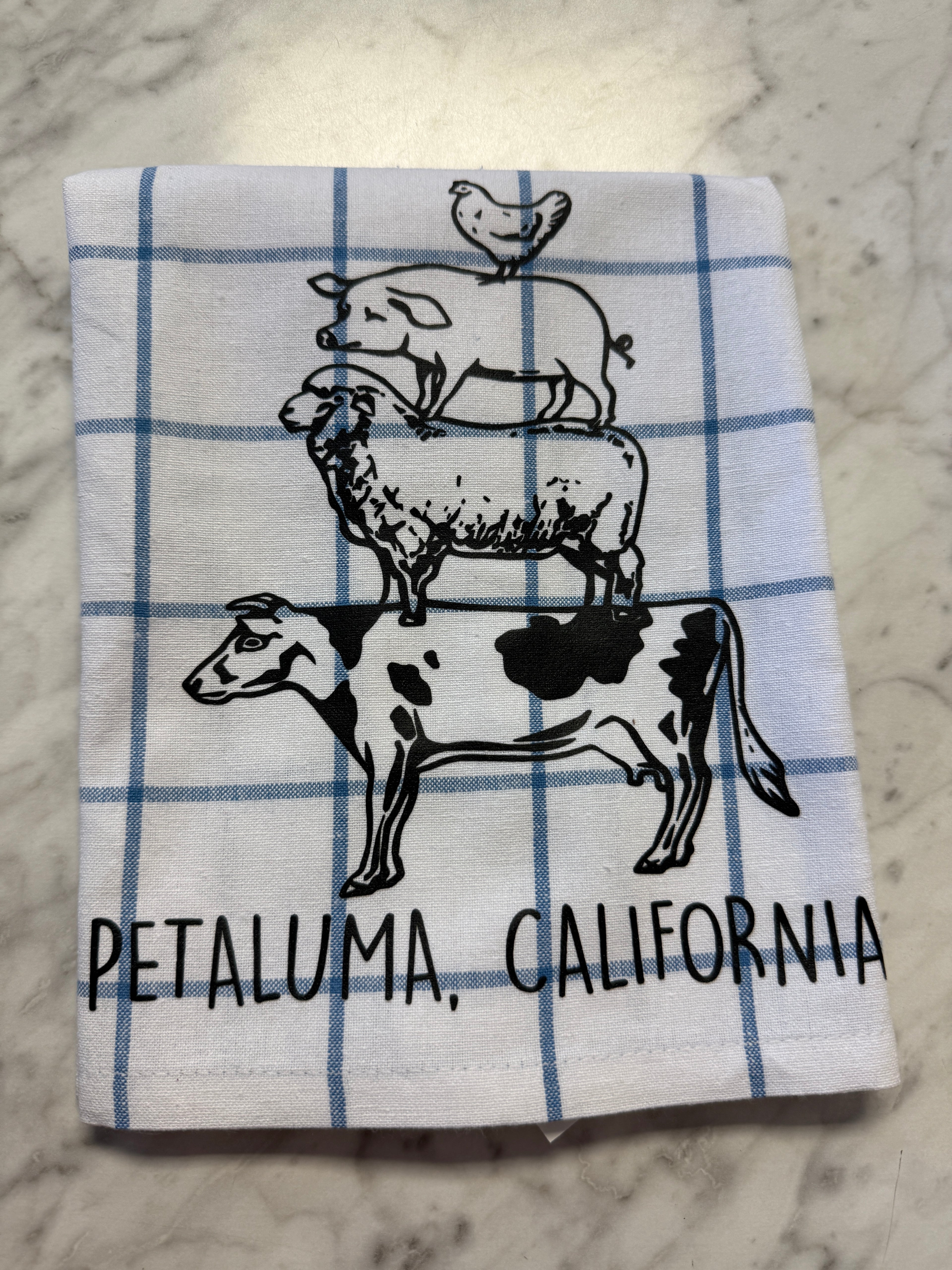 Fabric with cow illustrations and &