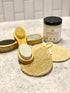 2 pedicure brushes, 2 loofah sponges, and 1 bottle of lotion