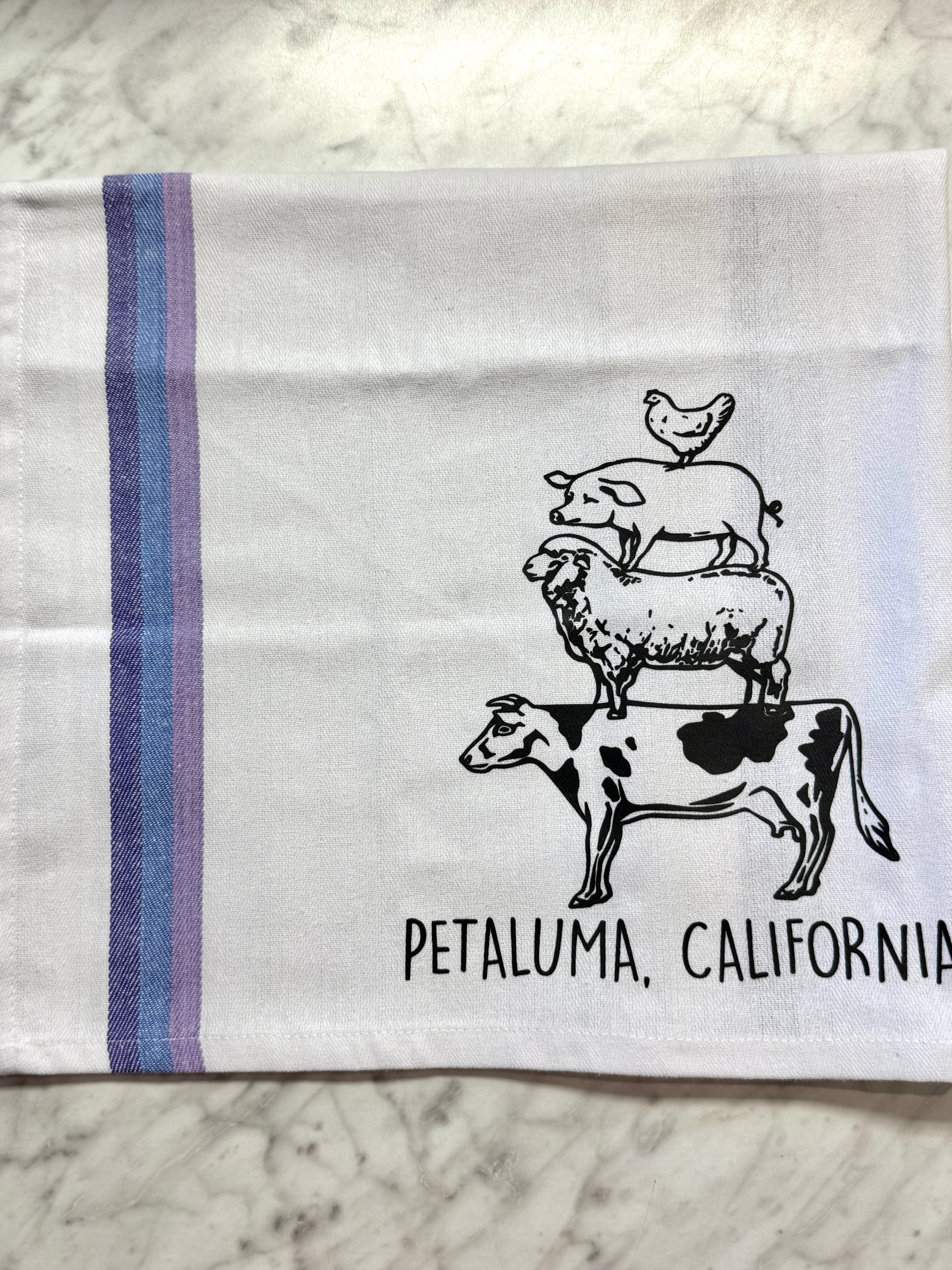 Tea towel with farm animal illustrations and &