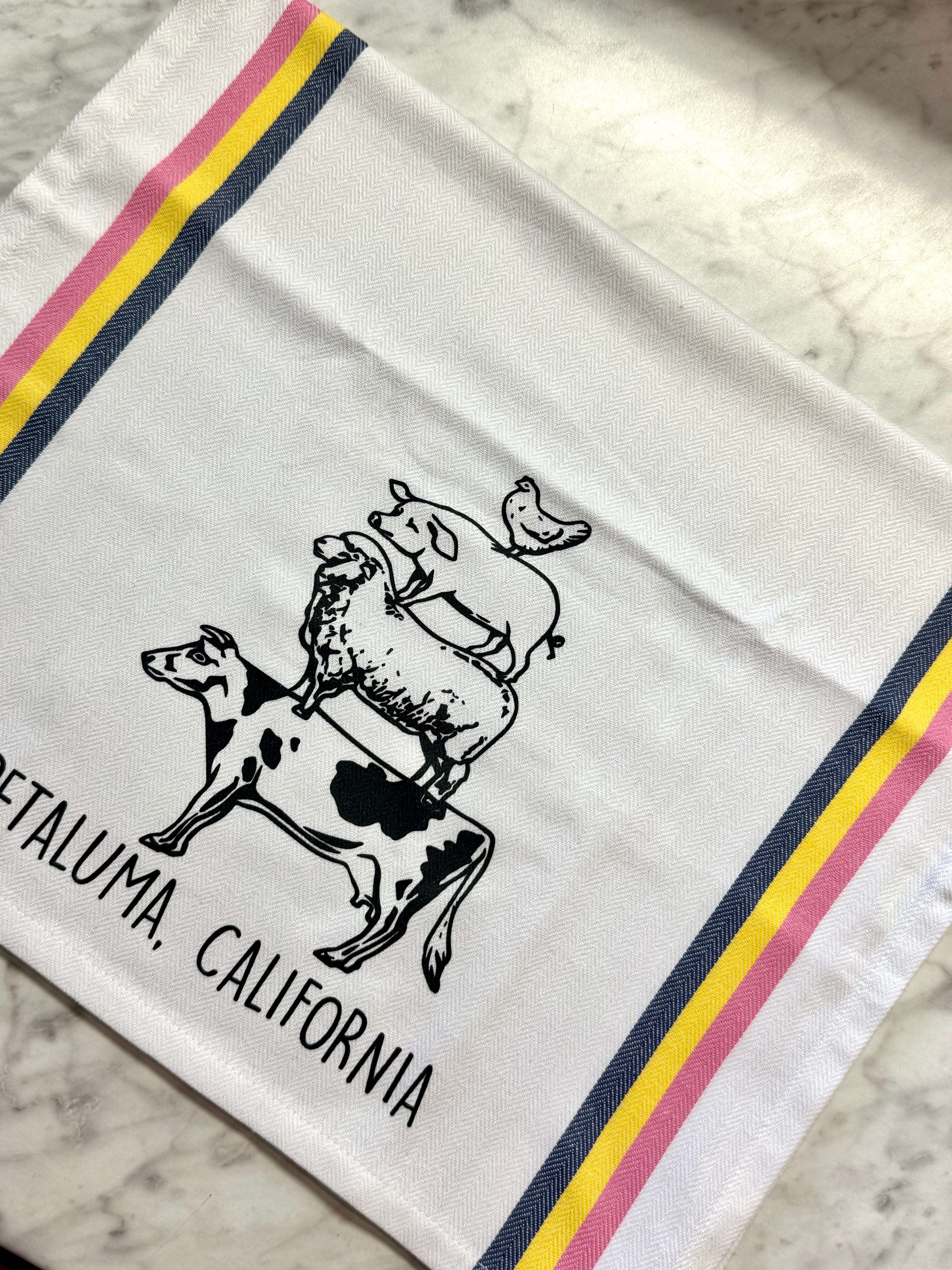 Fabric with a cow and calf design and &