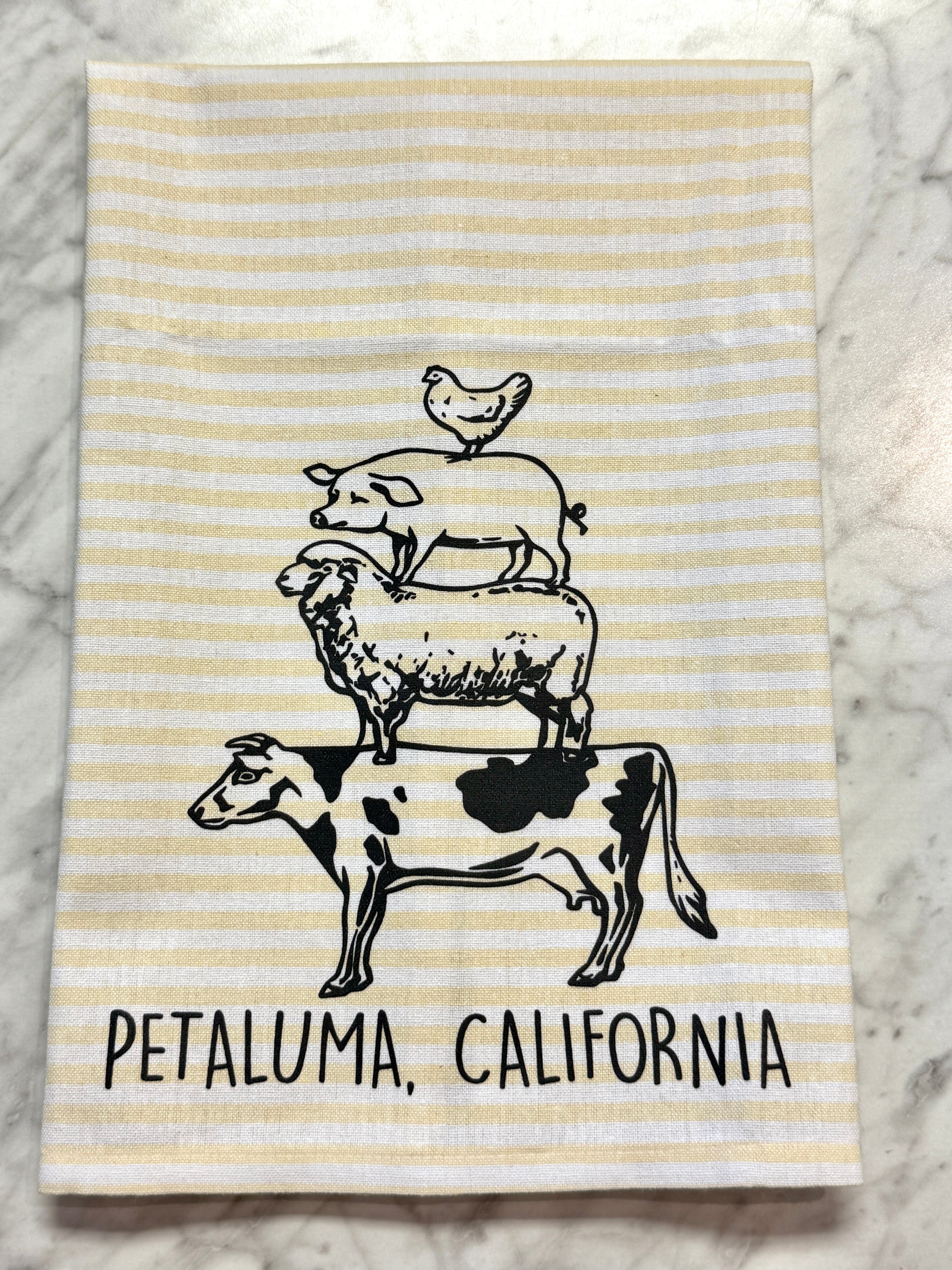 Striped towel with animal illustrations and &