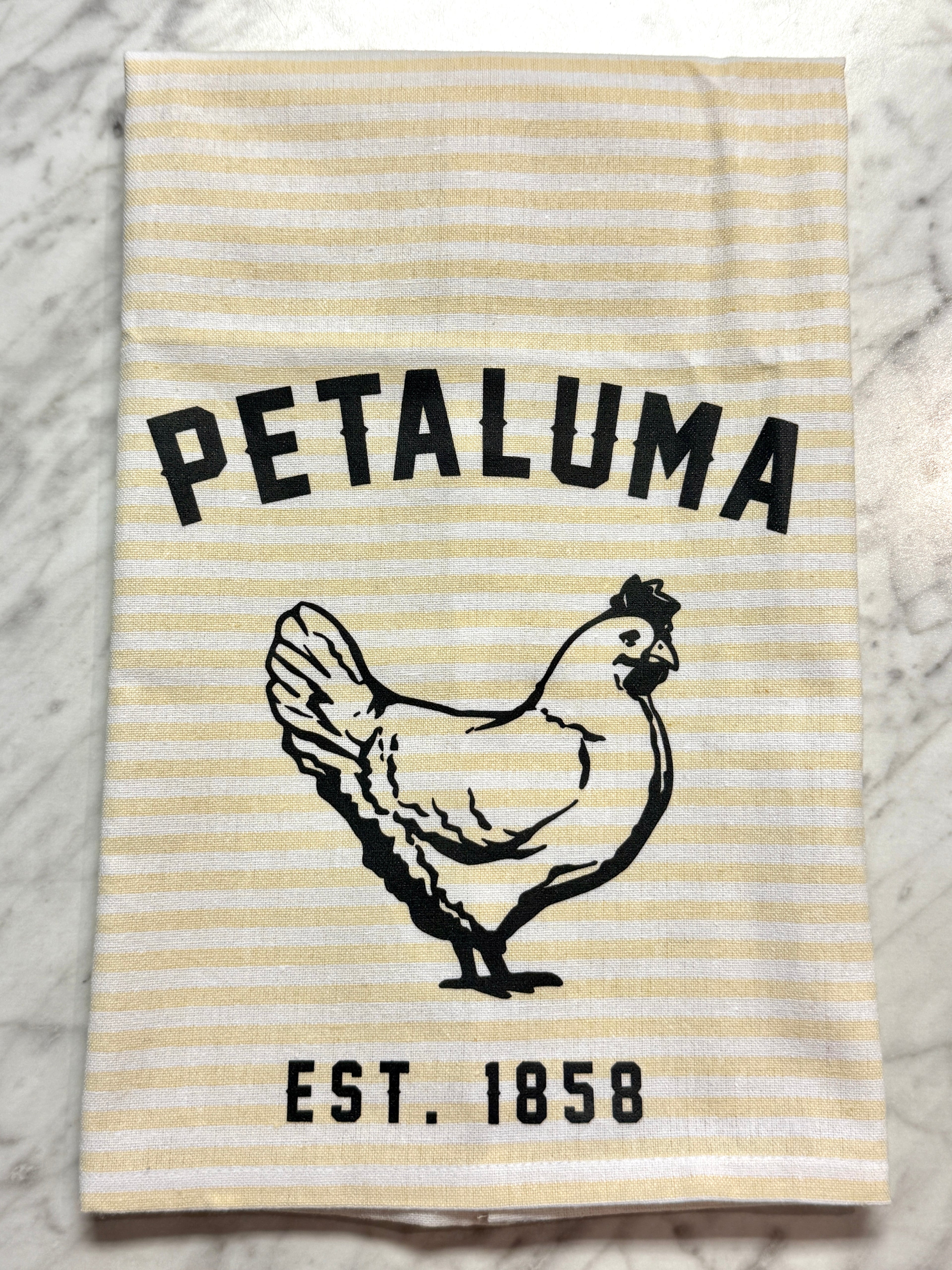 Striped towel with a chicken illustration and &