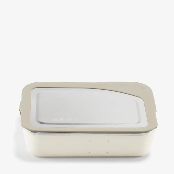 The Klean Kanteen Stainless Steel Lunch Box 34 oz is shown with a transparent lid against a white background. Featuring rounded corners and a simple modern design, it’s ideal for sustainable food storage.