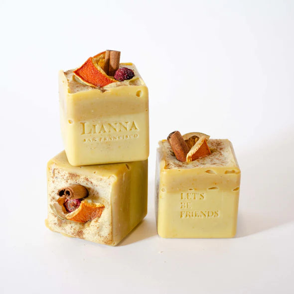 3 square bars of lianna soap with orange and cinnamon on top