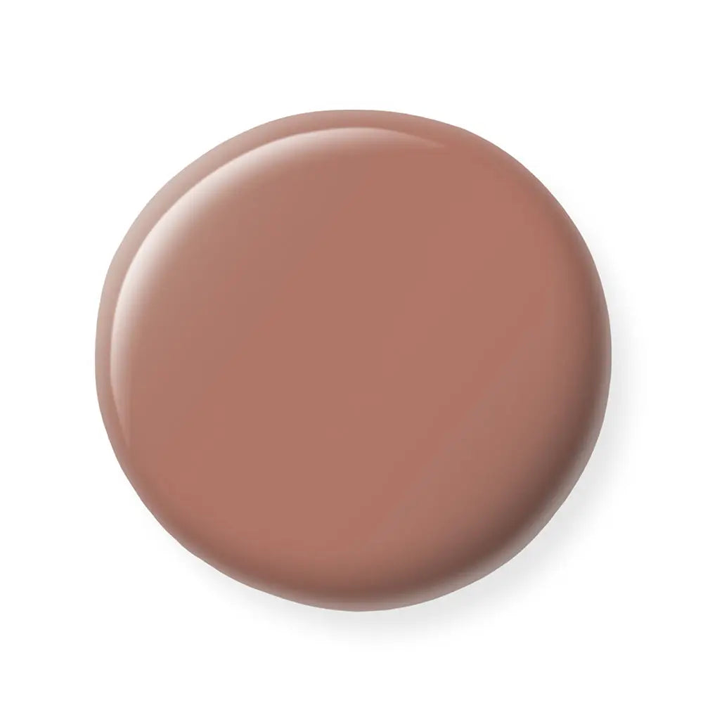 Nude-colored nail polish sample on a white background