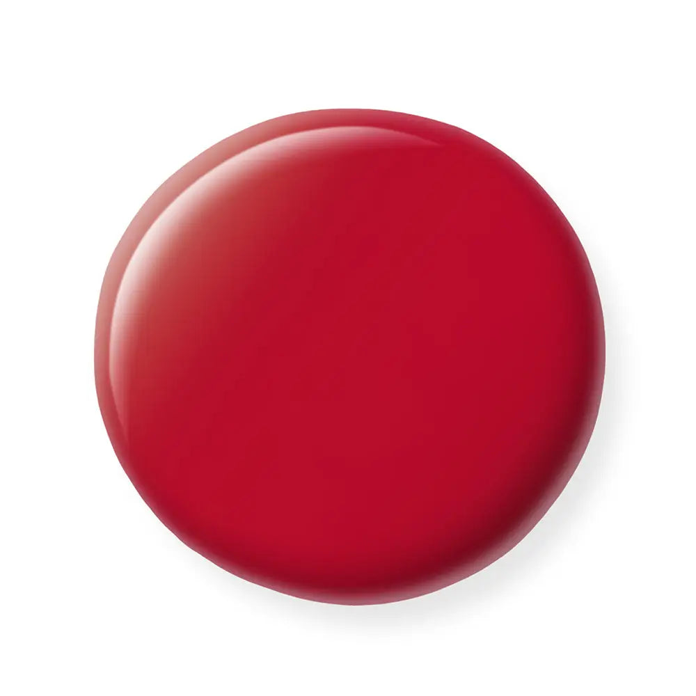Red nail polish sample on a white background