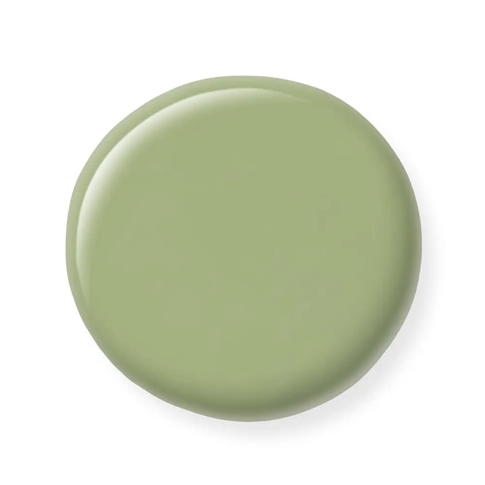 Green nail polish sample on a white background
