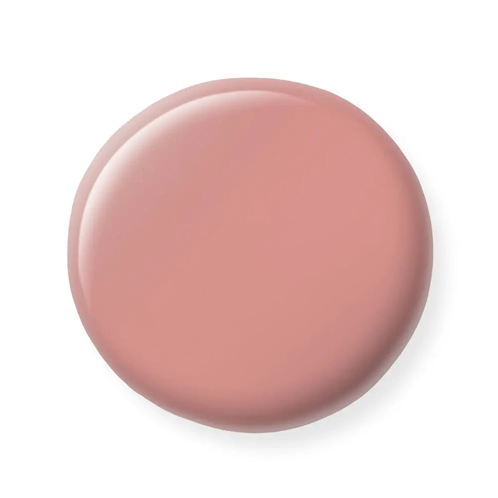 Nude-colored nail polish sample on a white background