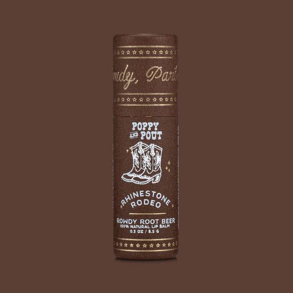 Brown lip balm container with branding on a brown background