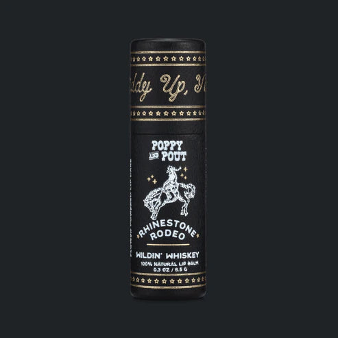 Black lip balm packaging with gold text and horse illustration on a black background