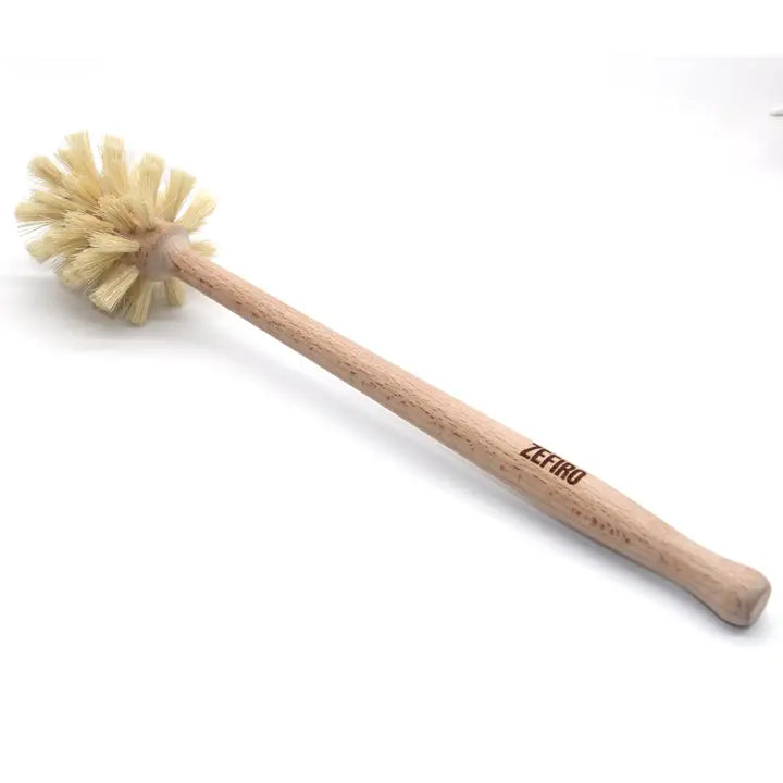 The Zefiro Beechwood Bottle/Toilet Brush features a smooth, eco-friendly beechwood handle and stiff, light-colored sisal bristles in a round head. The word ZERO is printed on the handle.