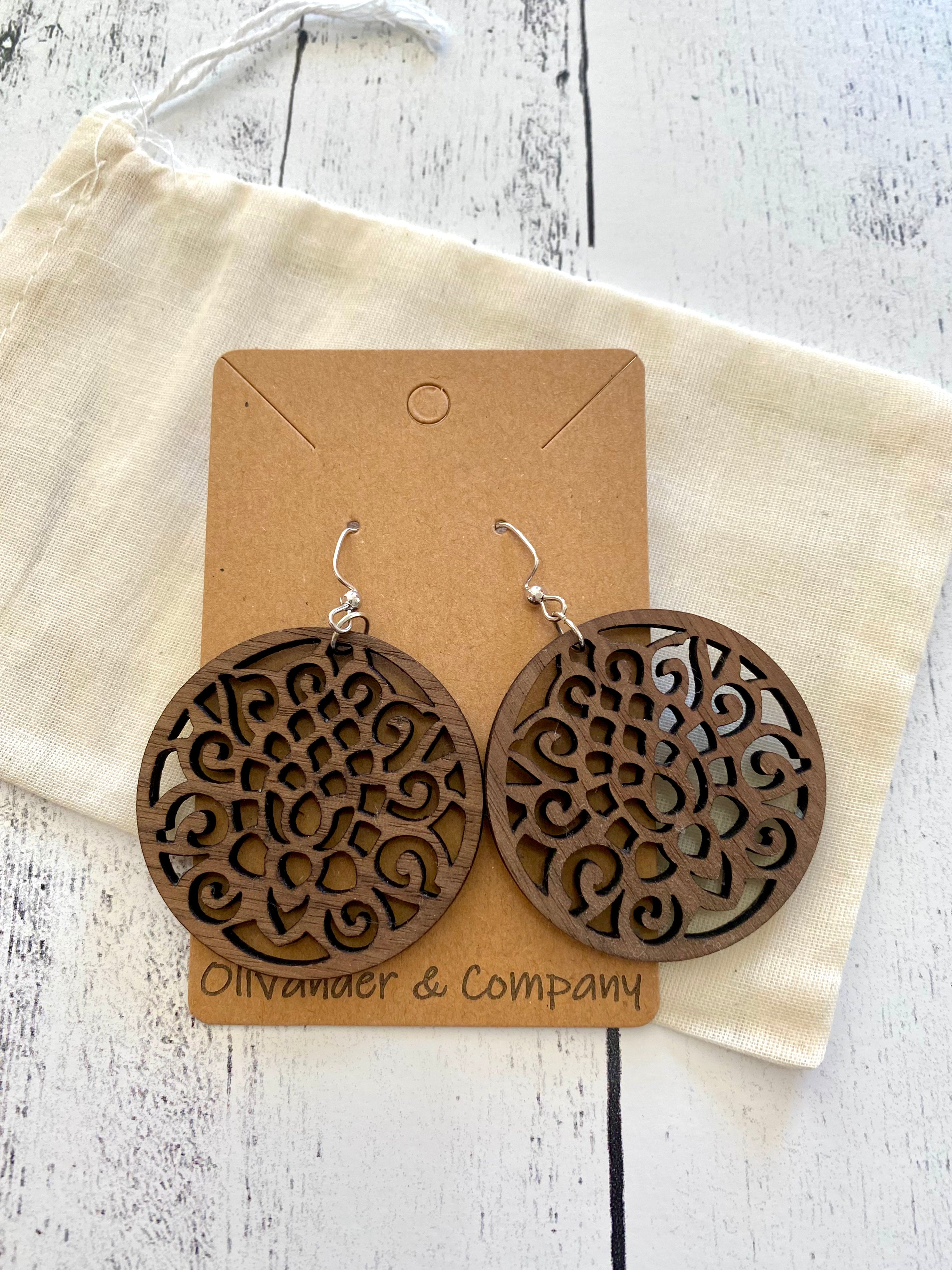 round wood laser earrings with muslin fabric pouch