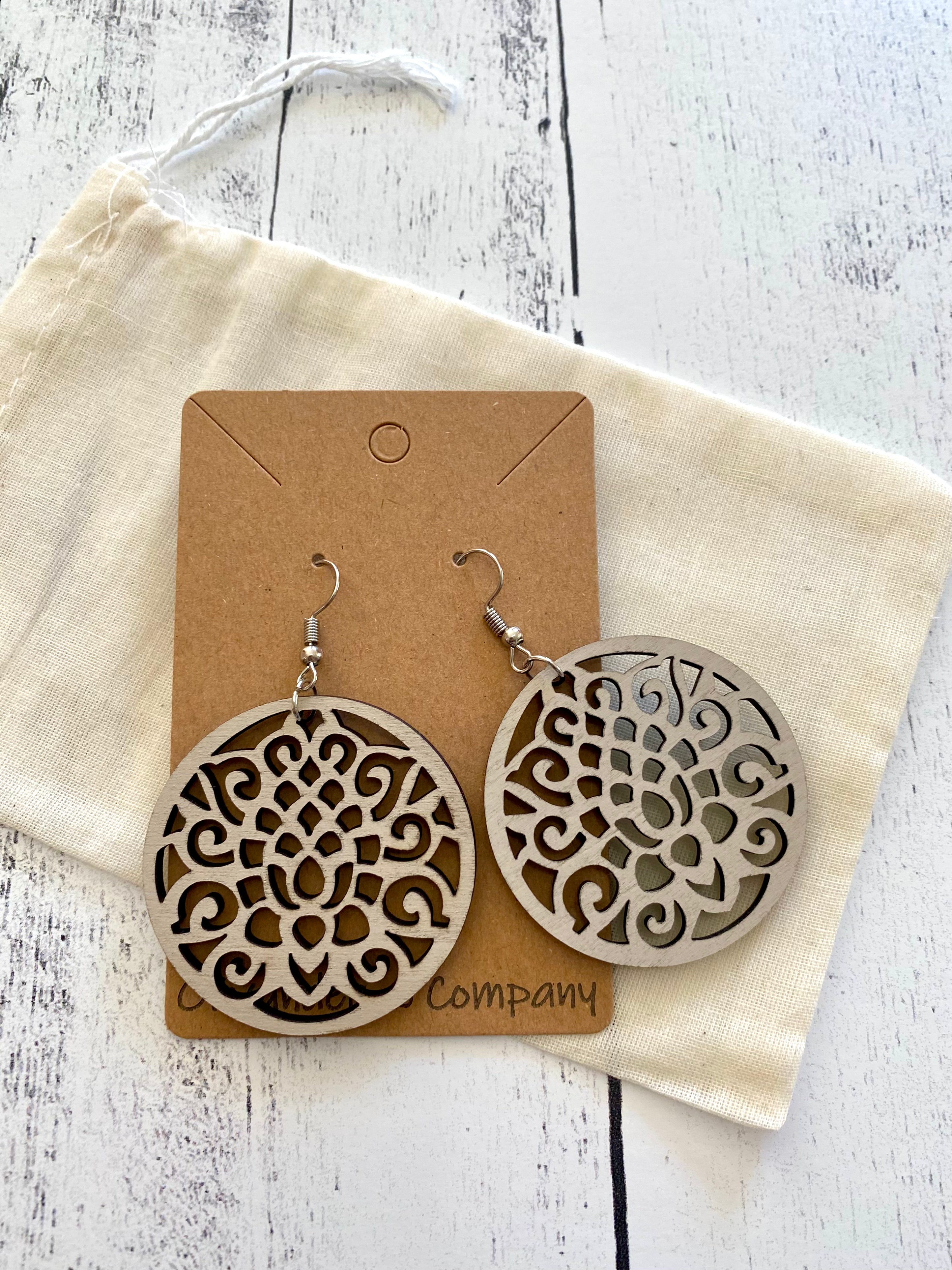 round wood laser earrings with muslin fabric pouch