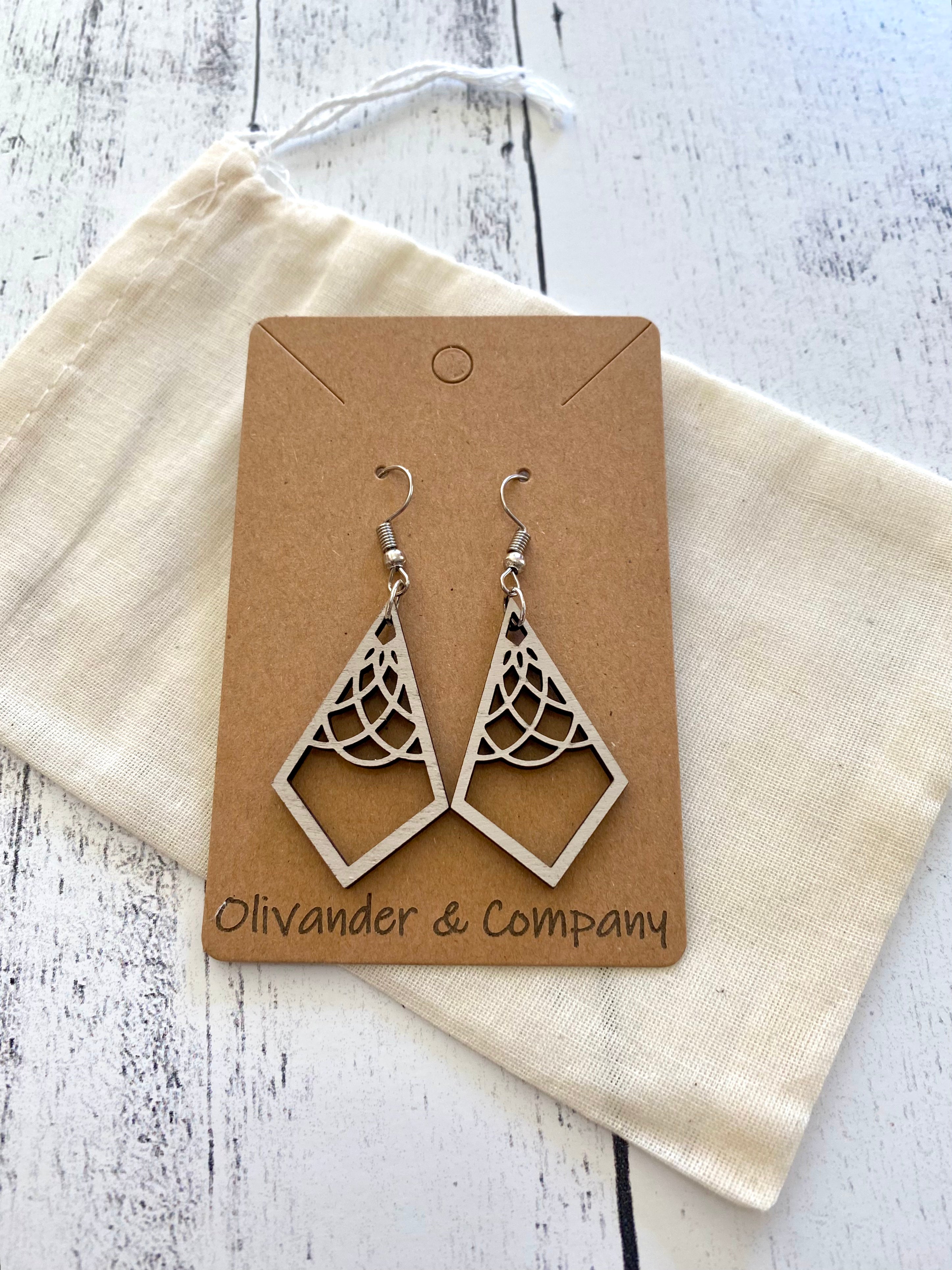 white diamond wood laser earrings with muslin fabric pouch
