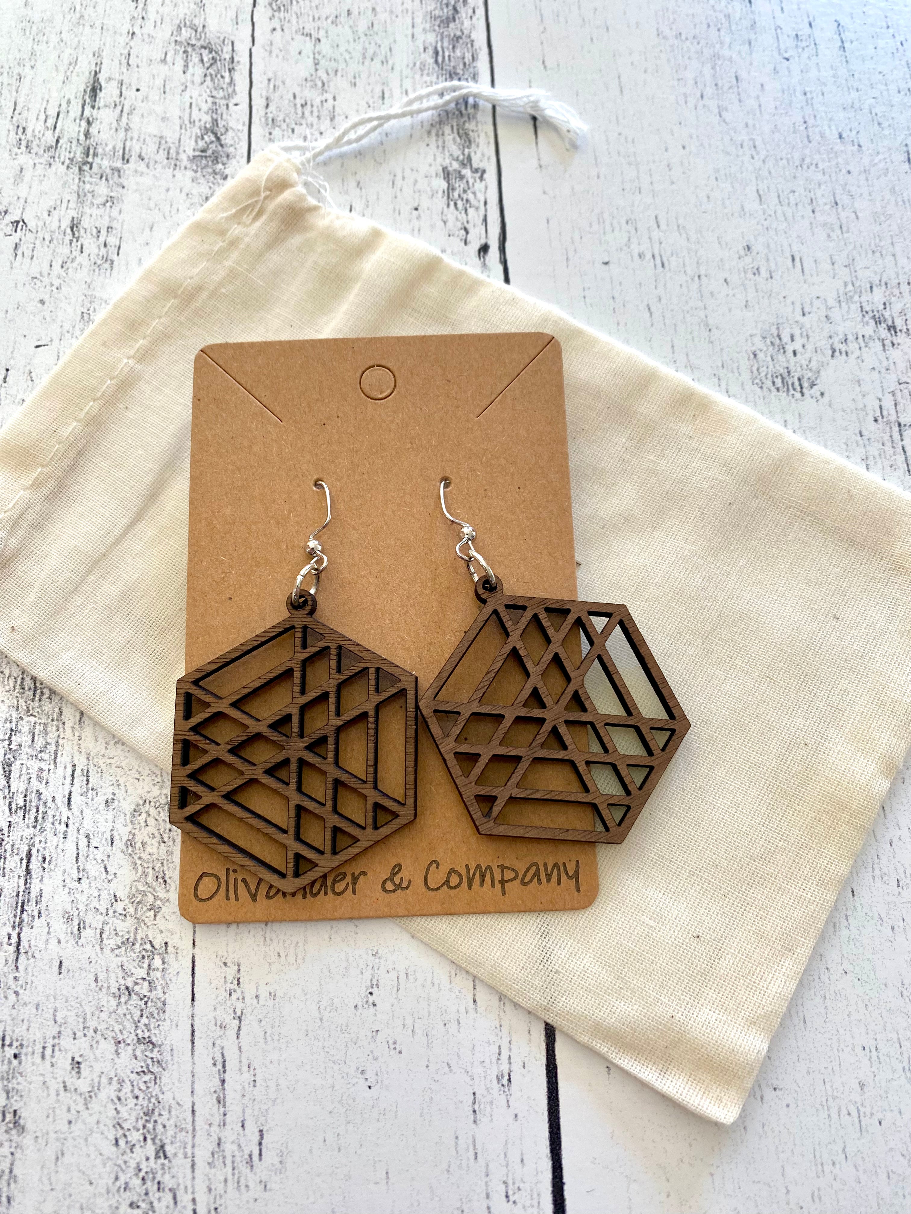 brown wood laser earrings with muslin fabric pouch