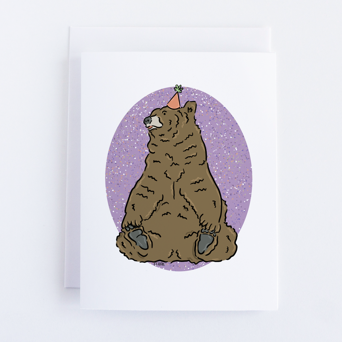 Artwork by Kate Pinto of a brown bear in a pink party hat with green pom-pom, set against a purple, sparkly oval—ideal for eco-friendly Greeting Cards from Bean Horse Car Designs.