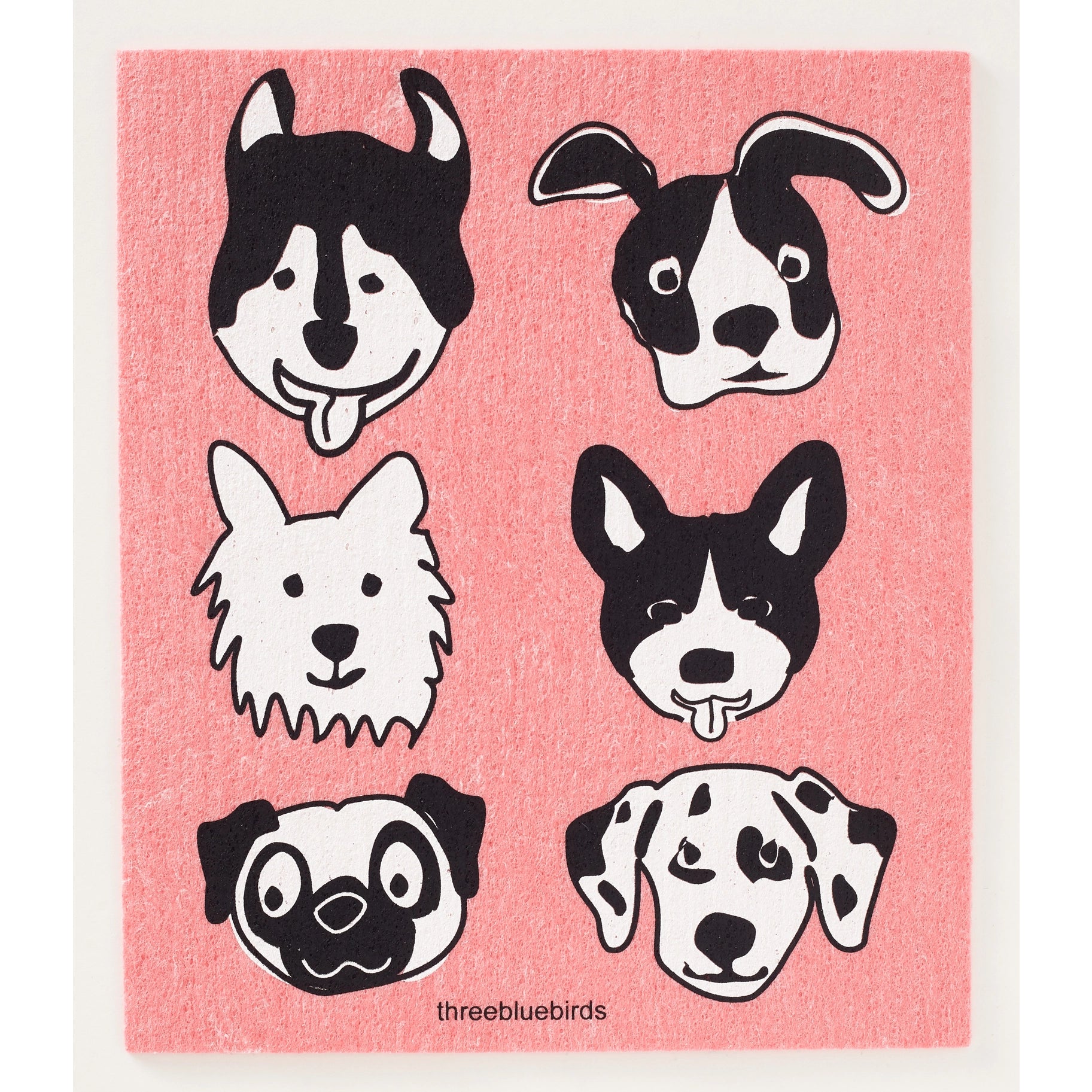 The Cats and Dogs Swedish Dishcloth by Three Bluebirds Swedish Dishcloths features six unique black-and-white cartoon dog faces on a pink background, making eco-friendly cleaning fun and stylish.