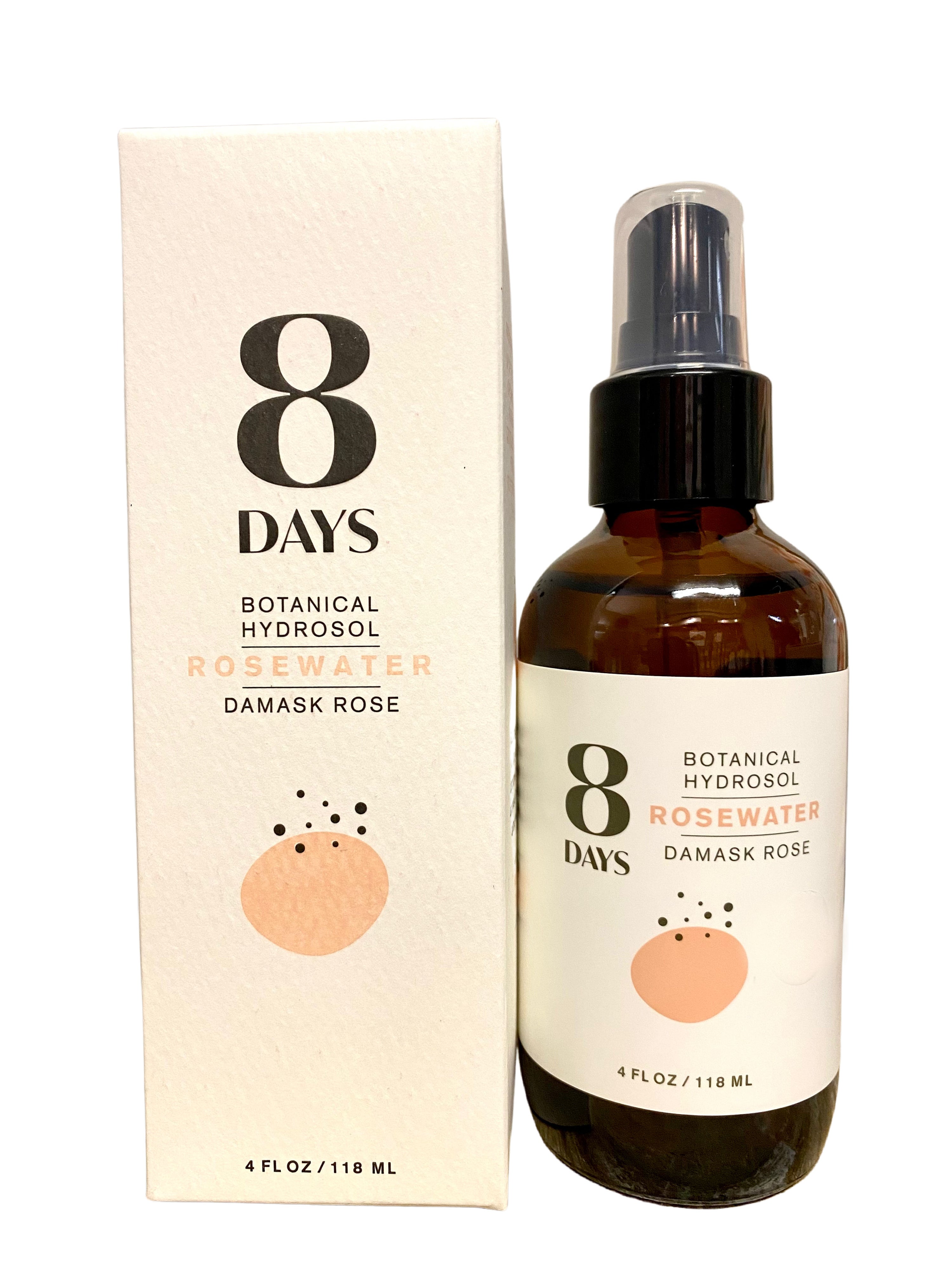A bottle of 8 Days Botanicals Rosewater spray sits beside its box, both showcasing minimalist black text and a peach circle. This cruelty-free, steam-distilled hydrosol comes in a 4 fl oz (118 ml) size.