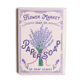 Flower Market Soap Co. paper soap packaging with lavender design on a white background
