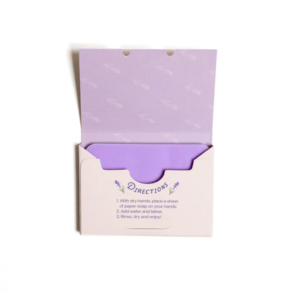 Purple paper soap with directions on a white background