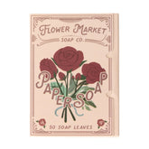 Flower Market Soap Co. paper soap packaging with red roses on a beige background Eco-friendly travel paper soap by 123 Farm in Cherry Valley, CA