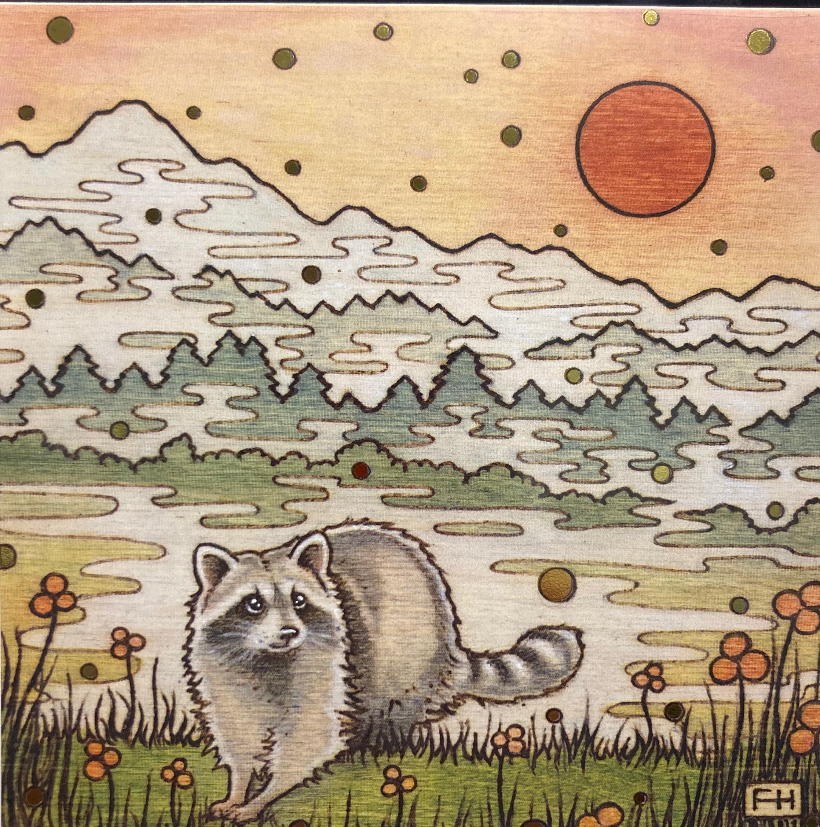 A raccoon stands in grass near orange flowers with a river, pine trees, and snowy mountains behind under an orange sky—art by Fay Helfer. Perfect for local artist cards: Artist Fay Helfer Greeting Cards by Fay Helfer.