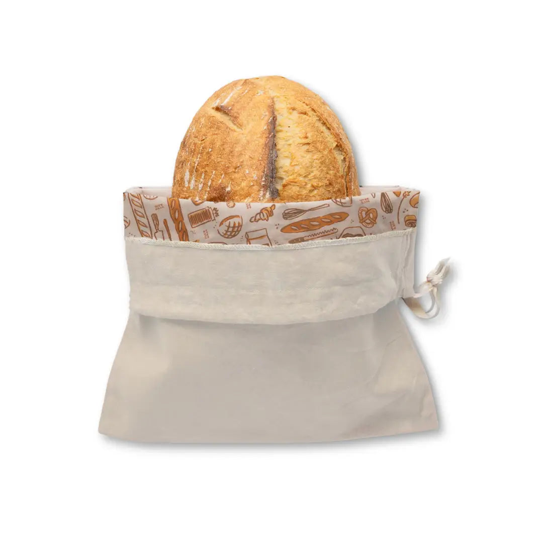 A round loaf of bread in a Bee&