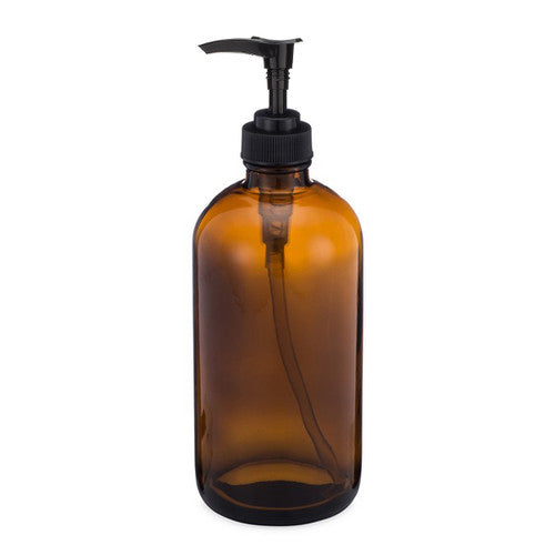 The Berlin Packaging 16 oz Amber Glass Bottle with Pump features a black plastic dispenser, perfect for eco-friendly storage of soap or lotion. This plain, unlabelled bottle stands upright on a white background.