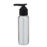 The Berlin Packaging Aluminum Bottle with Pump stands upright against a plain white background, featuring a ribbed cap and black pump in a brushed aluminum finish.