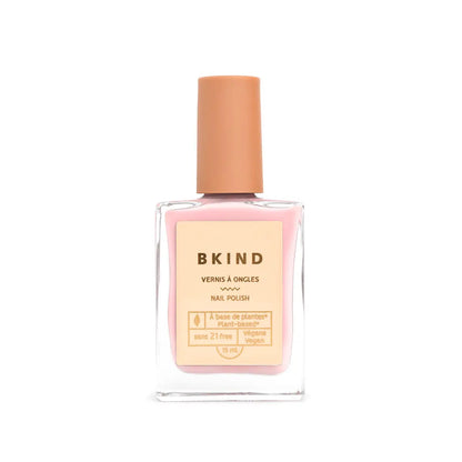 BKind nail polish bottle with beige cap on a white background