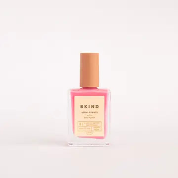 bottle of bkind nail polish in light pink