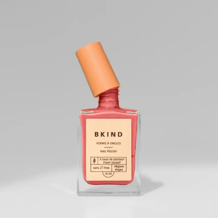 bkind pink nail polish with lid tilted 