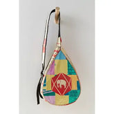 Colorful quilted bag with geometric pattern and elephant design on a white background