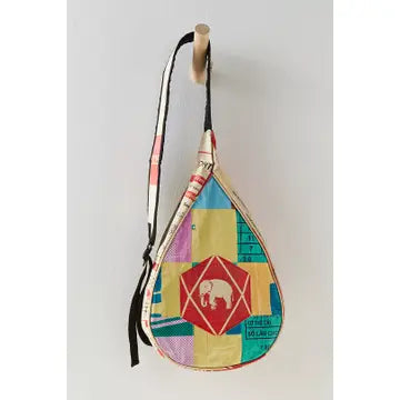 Colorful quilted bag with geometric pattern and elephant design on a white background