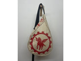 Beige bag with red emblem featuring a winged horse on a white background