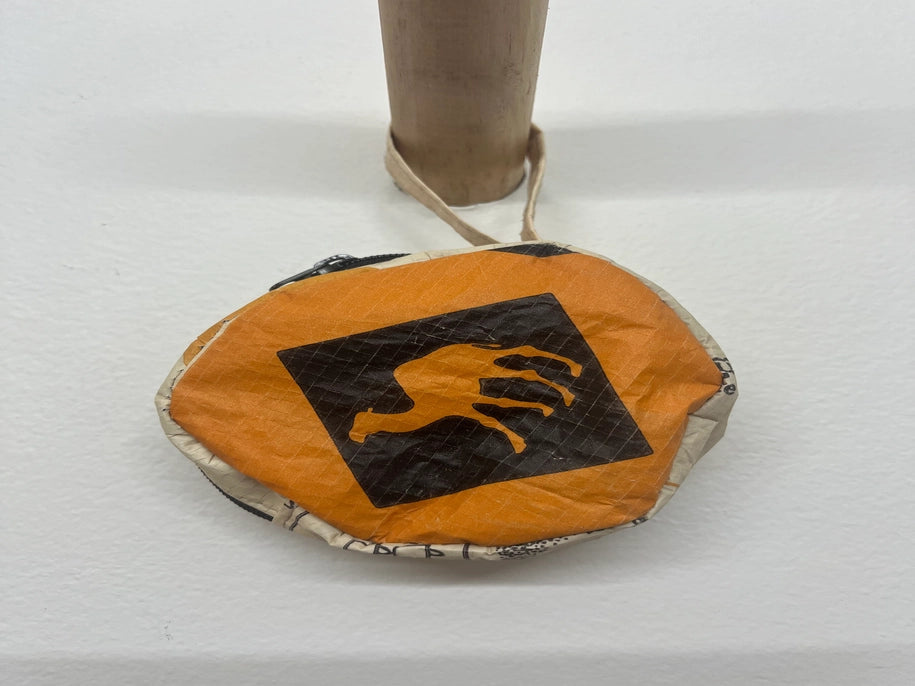 orange stash bag with camel