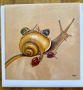 A large snail with four colorful snails on its shell and a rainbow behind is set against a beige background. FH initials in the corner represent Fay Helfer’s art, featured on Artist Fay Helfer Greeting Cards by Fay Helfer.