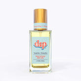 dip hair and body dry oil in a clear bottle with gold lid-tangerine honeydew