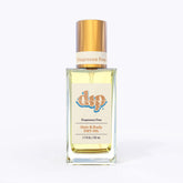 dip hair and body dry oil in a clear bottle with gold lid-unscented