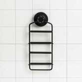 The Dip & Drip Wall Mount Adapter by Dip is secured to a white tiled wall using a large round twist-lock suction cup, providing stable attachment for accessories on non-porous surfaces.